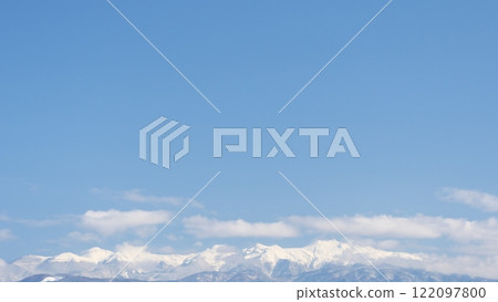Blue sky and the Northern Alps (Hida Mountains) in winter. 122097800