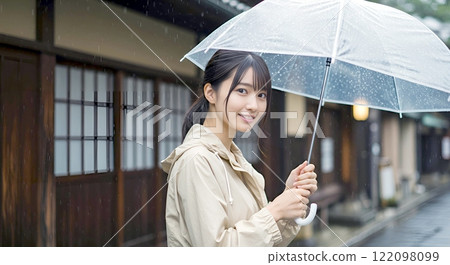 A woman holding an umbrella 122098099
