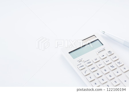 White calculator and ballpoint pen White calculator and ballpoint pen 122100194