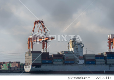 Cargo ship moored at container terminal 122102117