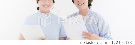 Image of gynecological examination: nurse and patient, no face 122103158