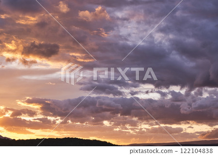 Vibrant Sunset with Dramatic Clouds 122104838