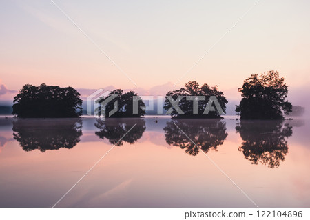 Four islands floating on Lake Onuma in the morning Four islands floating on Lake Onuma in the morning 122104896