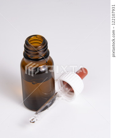 Pipette bottle mockup medical brown glass on the white backround Pipette bottle mockup medical brown glass on the white backround 122107931
