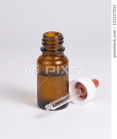 Pipette bottle mockup medical brown glass on the white backround Pipette bottle mockup medical brown glass on the white backround 122107932