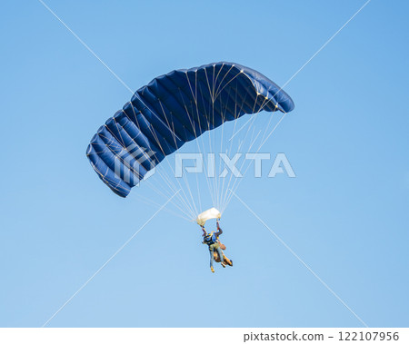 Skydiver activity sport jump on the blue sky background 122107956