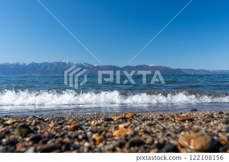 Snowy scenery of the west side of Lake Biwa seen from the lakeshore near Kurimi, Omihachiman City 122108156