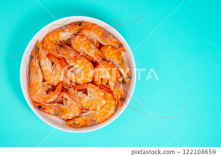 Sea shrimp fresh on blue background Sea shrimp fresh on blue background 122108659