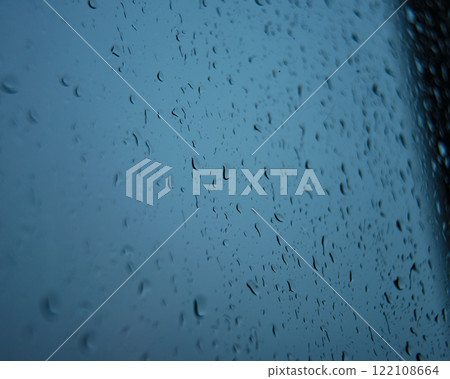 Wet window glass with raindrops cold weather Wet window glass with raindrops cold weather 122108664