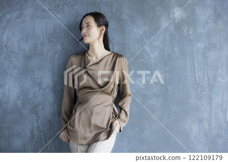 A young woman looking at the camera A young woman looking at the camera 122109179