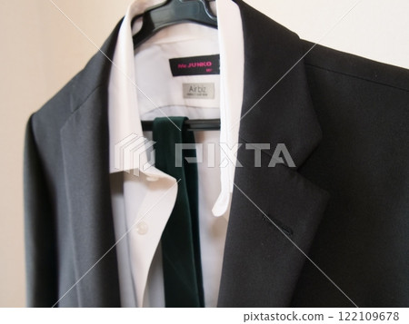 Black suit, outerwear, material, lettering Black suit, outerwear, material, lettering 122109678