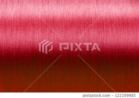 Closed up of red color of thread textured background (Focus at center of picture) Closed up of red color of thread textured background (Focus at center of picture) 122109985