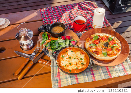 Cooking Italian food outdoors 122110281