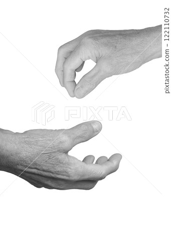Elderly female hand open and reaching, palm up, fingers slightly curled, gesture expressing offer or 122110732
