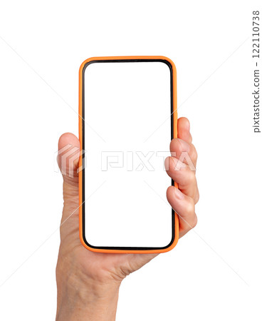 Elderly caucasian woman's hand holding a smartphone with a blank screen and orange case, upright Elderly caucasian woman's hand holding a smartphone with a blank screen and orange case, upright 122110738