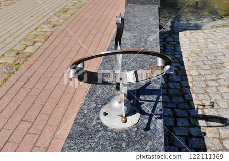 sundial on the granite embankment in Kaliningrad sundial on the granite embankment in Kaliningrad 122111369