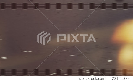 Vintage background. Old film strip with dust and scratches 122111884