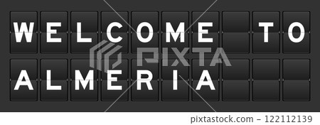 Black color analog flip board with word welcome to almeria on gray background Black color analog flip board with word welcome to almeria on gray background 122112139