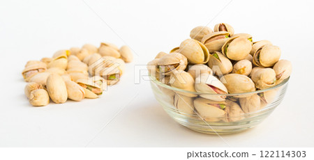 Roasted pistachios on white background 122114303