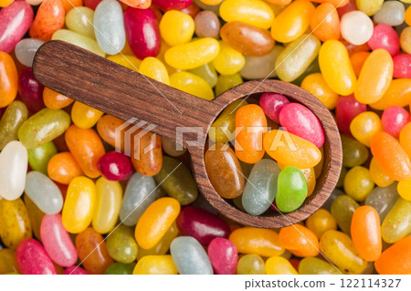 Multicolored jelly beans with various flavors in scoop. Top view. Multicolored jelly beans with various flavors in scoop. Top view. 122114327
