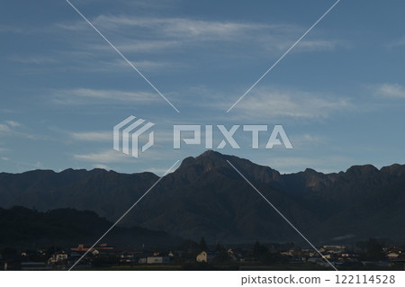 Hakushu Town, Hokuto City, Mount Kaikoma in the Southern Alps and the townscape of Hakushu at its base in late October 122114528