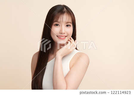 Beautiful young asian woman with clean fresh skin on beige background, Face care, Facial treatment, Cosmetology, beauty and spa, Asian women portrait. 122114923