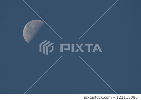 The waning crescent moon remains in the dawn sky in Hakushu Town, Hokuto City 122115086