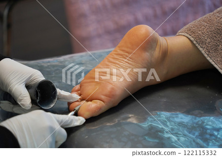 process of foot care in a beauty salon process of foot care in a beauty salon 122115332