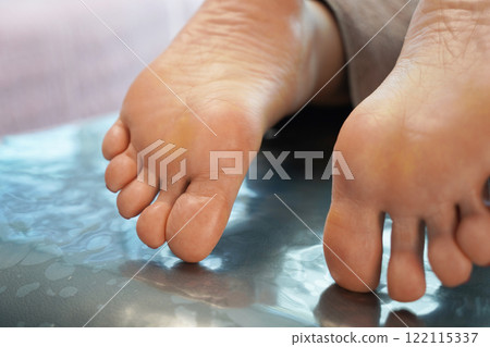 process of foot care in a beauty salon 122115337