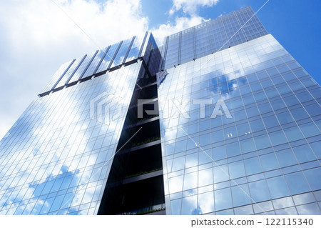 Clouds in the window of the building 122115340