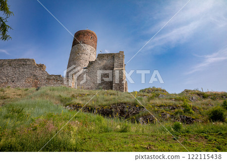 Explore the ancient ruins that stand tall amidst an exceptionally lush, green landscape 122115438