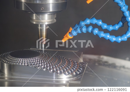 The CNC milling machine cutting injection mold part by solid ball end mill tool. The CNC milling machine cutting injection mold part by solid ball end mill tool. 122116091
