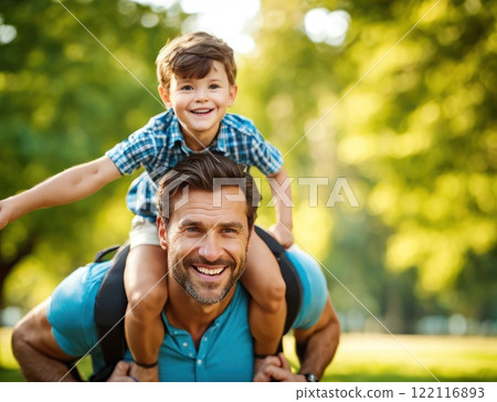 Father giving son ride on back in park. Portrait of happy father giving son piggyback ride on his shoulders and looking up. Cute boy with dad playing outdoor. AI Father giving son ride on back in park. Portrait of happy father giving son piggyback ride on his shoulders and looking up. Cute boy with dad playing outdoor. AI 122116893