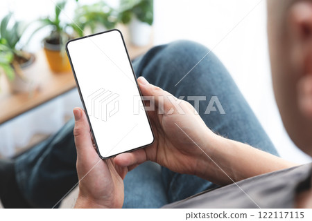 Man holding smart phone with blank screen Man holding smart phone with blank screen 122117115