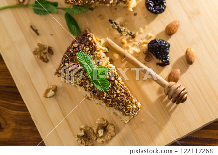 Homemade sponge cake with nuts and prunes 122117268