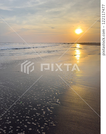 Ocean shore at dusk time colors Ocean shore at dusk time colors 122117477