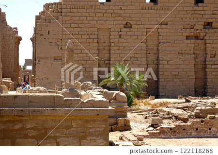 Ancient Karnak Temple Complex Featuring a Towering Obelisk and Stone Walls in Egypt 122118268