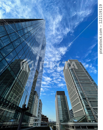 Landscape of the office town looking up at a skyscraper Landscape of the office town looking up at a skyscraper 122119119