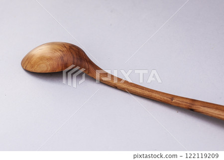 Wooden kitchen utensils stacked view close up isolated 122119209
