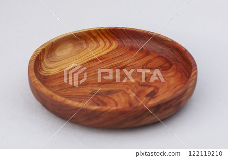 Wooden kitchen utensils stacked view close up isolated Wooden kitchen utensils stacked view close up isolated 122119210