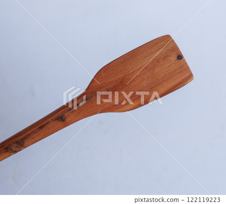 Wooden kitchen utensils stacked view Wooden kitchen utensils stacked view 122119223