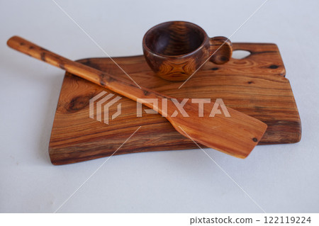 Wooden kitchen utensils stacked view Wooden kitchen utensils stacked view 122119224