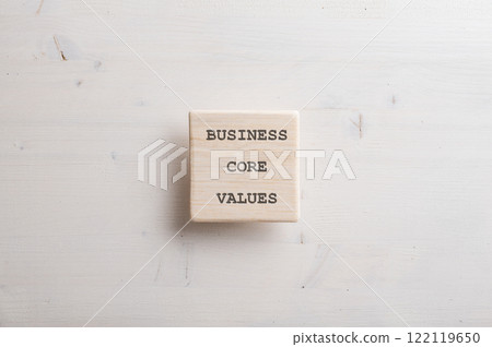 Wooden tile with a Business core value sign on it Wooden tile with a Business core value sign on it 122119650