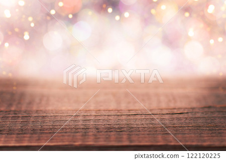 Festive wooden background with defocused shiny bokeh lights. Demonstrating color of 2025 year mocha mousse Festive wooden background with defocused shiny bokeh lights. Demonstrating color of 2025 year mocha mousse 122120225