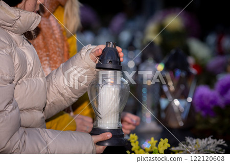 Candlelight Vigil Featuring Lanterns in a Beautifully Arranged Floral Setting Outdoors Candlelight Vigil Featuring Lanterns in a Beautifully Arranged Floral Setting Outdoors 122120608