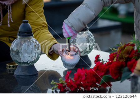 A Ceremony Dedicated to Lighting Candles in Remembrance and Honor of Loved Ones Lost A Ceremony Dedicated to Lighting Candles in Remembrance and Honor of Loved Ones Lost 122120644