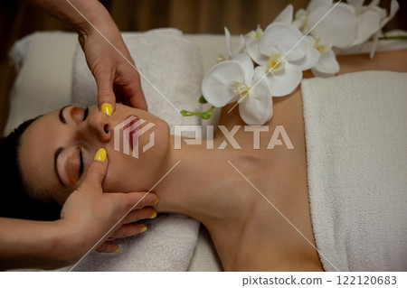 Experience a Relaxing Facial Treatment infused with Orchids in a Tranquil Spa Ambiance 122120683