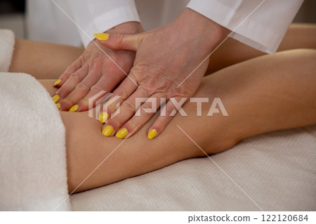 Experience a Relaxing and Soothing Massage Therapy Session in a Luxurious Spa Setting 122120684