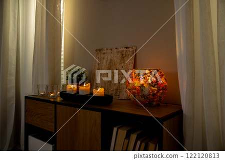 Enhance your home with cozy decor, beautiful candles, and accents for a warm atmosphere Enhance your home with cozy decor, beautiful candles, and accents for a warm atmosphere 122120813