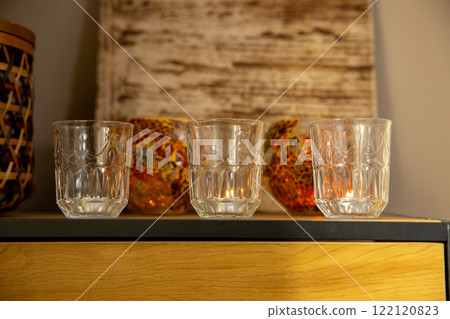 An Elegant Arranging of Beautiful Glassware Displayed on a Stylish and Modern Shelf An Elegant Arranging of Beautiful Glassware Displayed on a Stylish and Modern Shelf 122120823